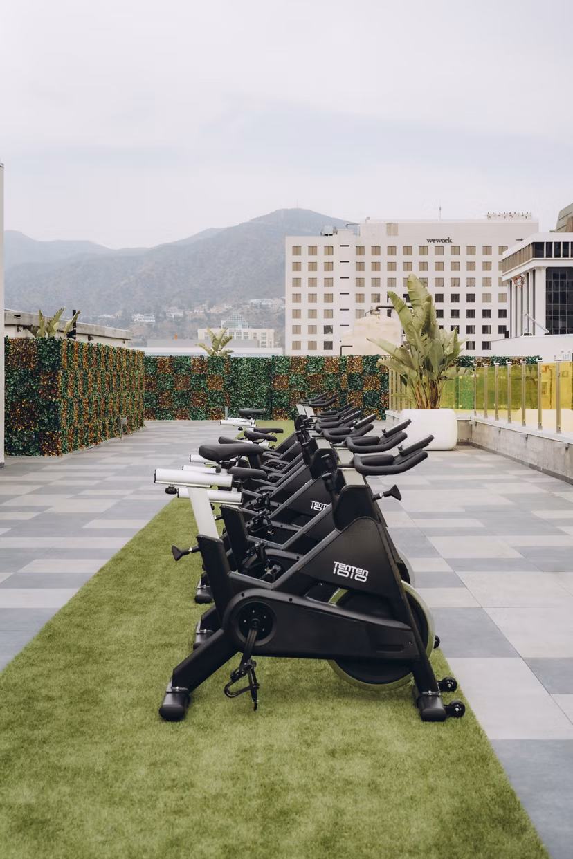 fitness center at TENTEN Campus Glendale Apartments 