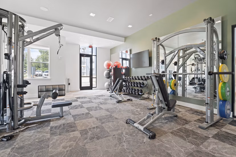 fitness center at The Arrowood Apartments 