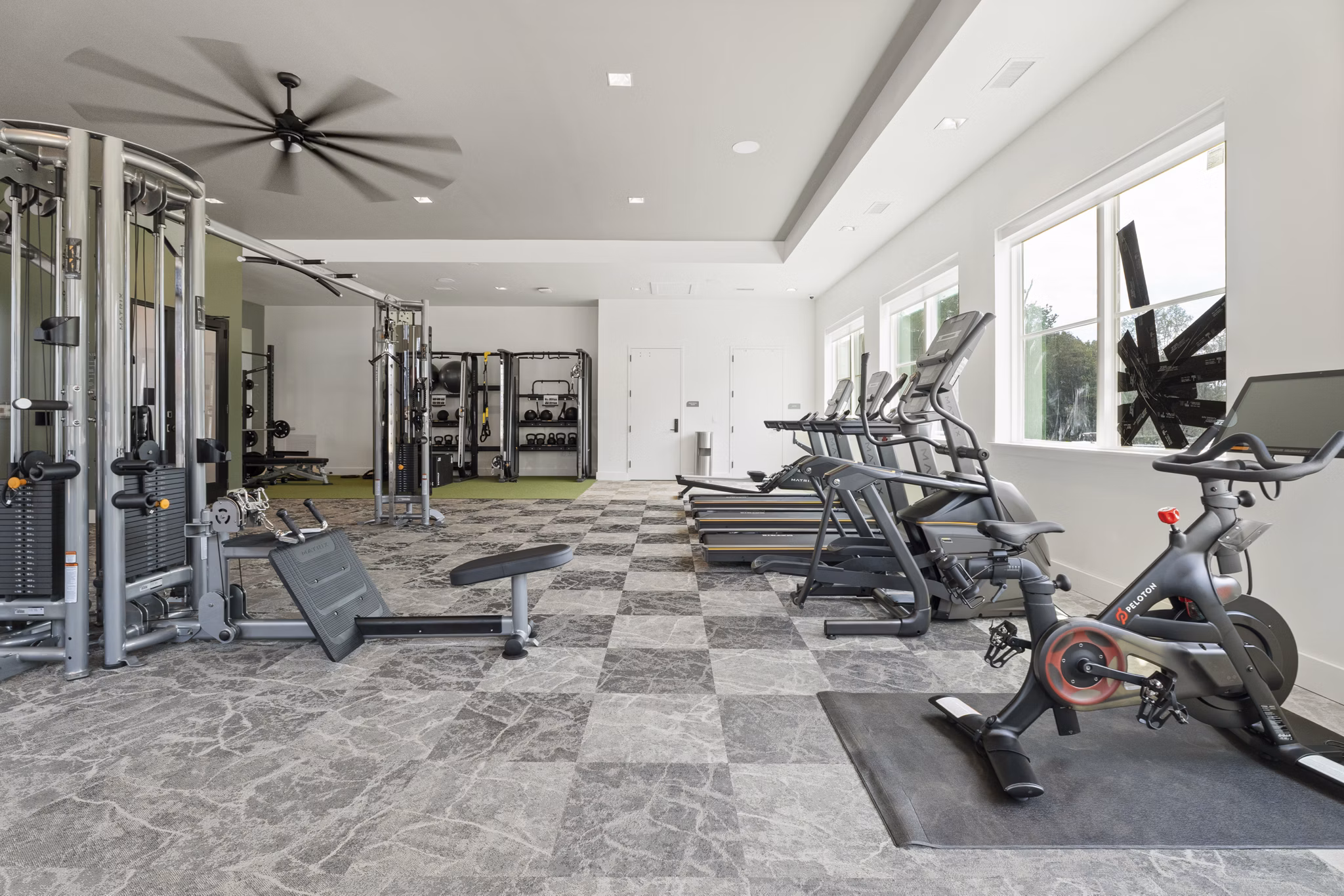 fitness center at The Arrowood Apartments 