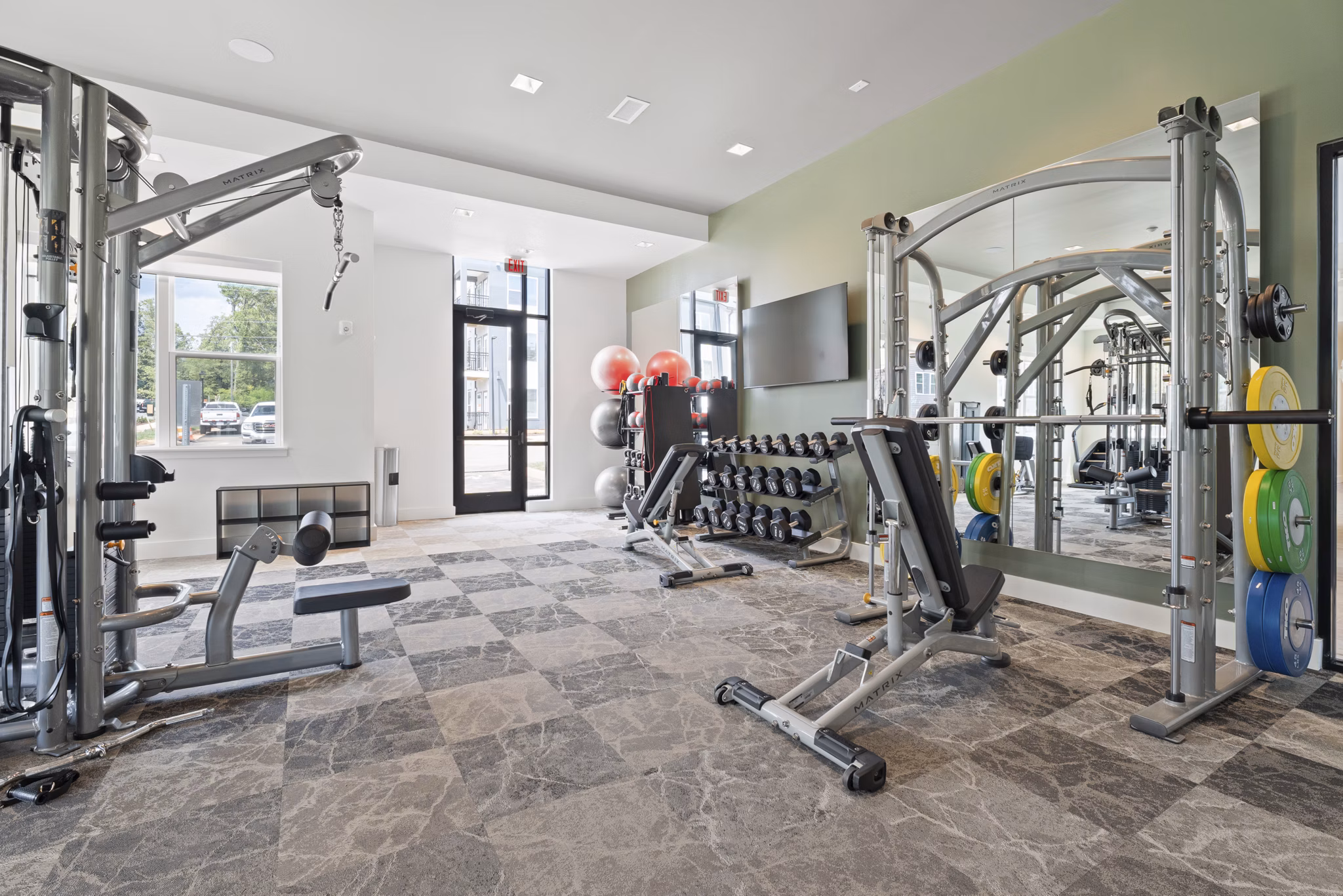 fitness center at The Arrowood Apartments 