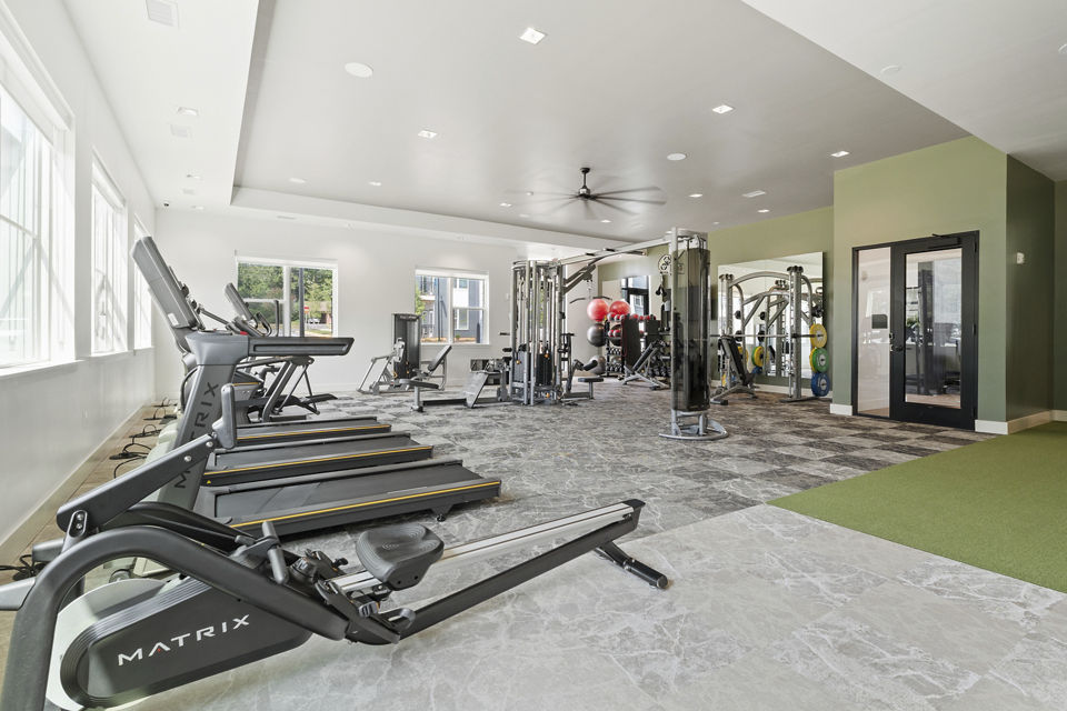 fitness center at The Arrowood Apartments 