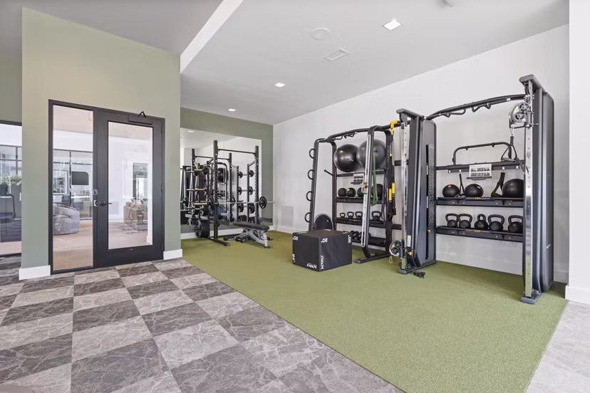 fitness center at The Arrowood Apartments 