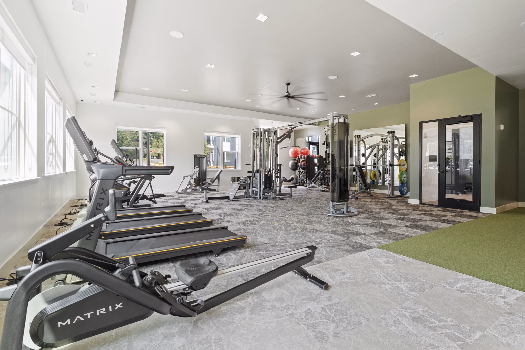 fitness center at The Arrowood Apartments 