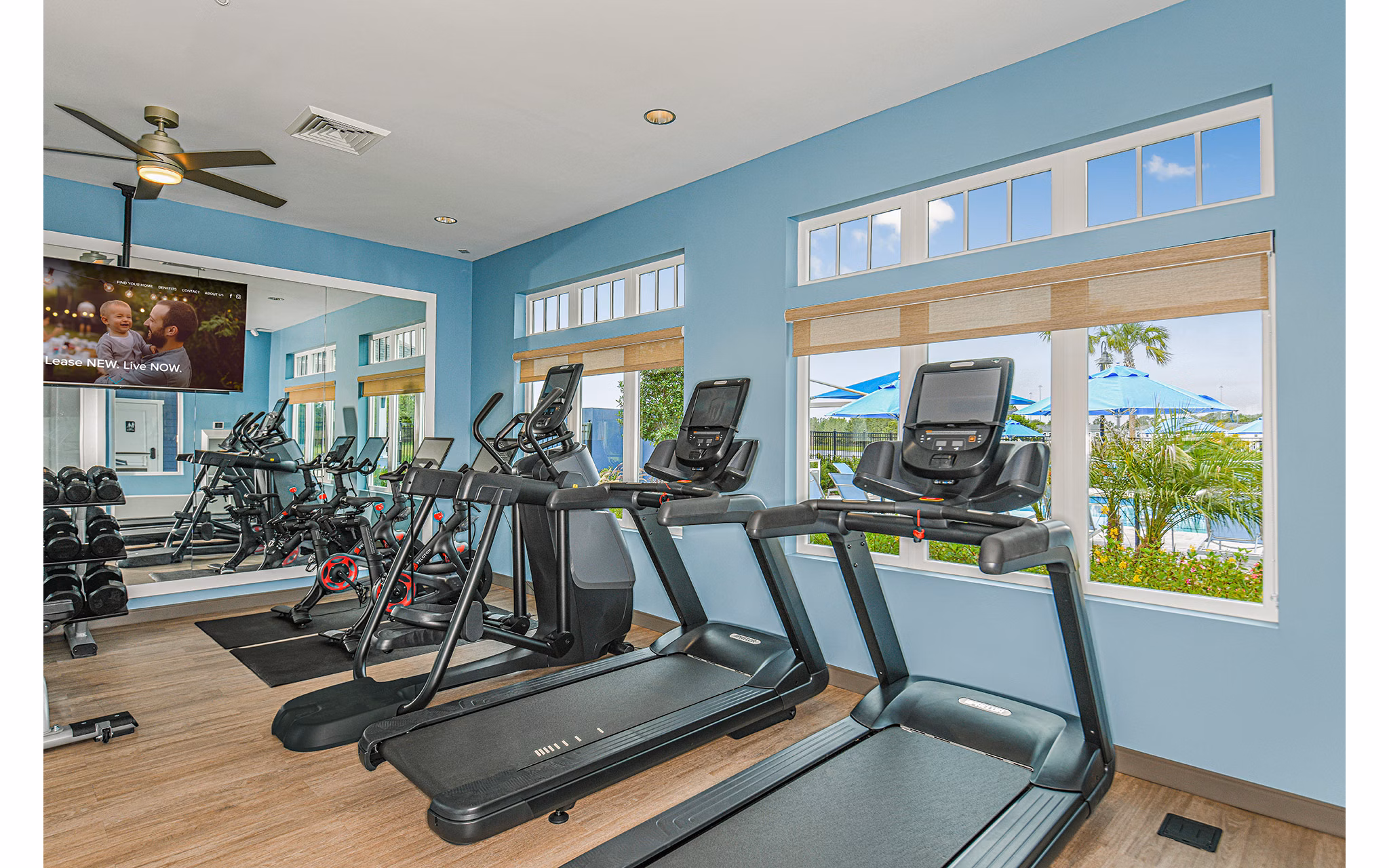 fitness center at 360 Communities at Avenues Walk Apartments