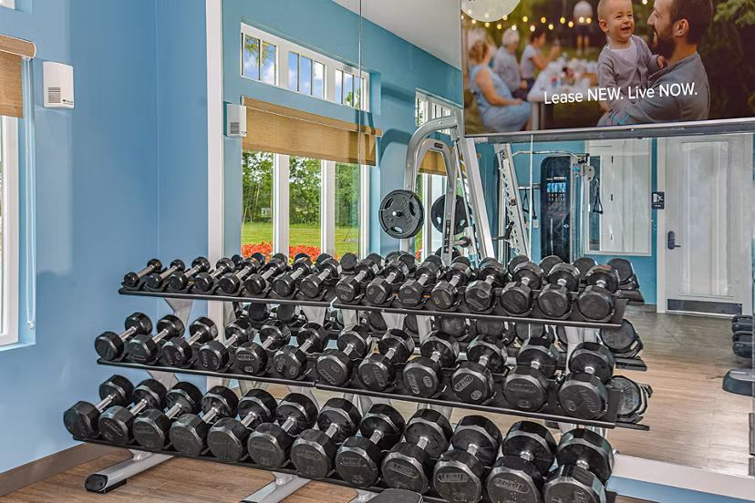 fitness center at 360 Communities at Avenues Walk Apartments
