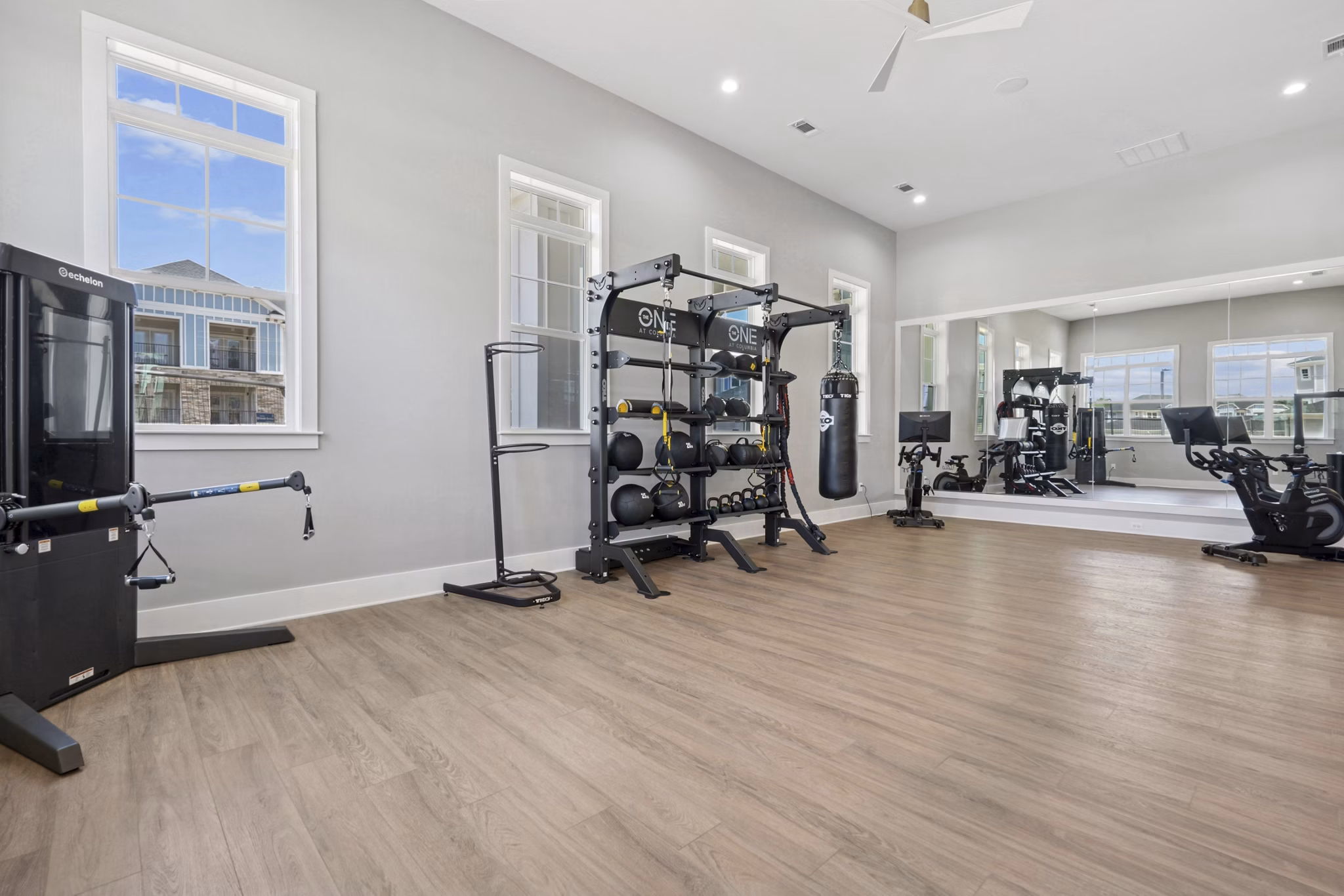 fitness center at The One at Columbia Apartments 