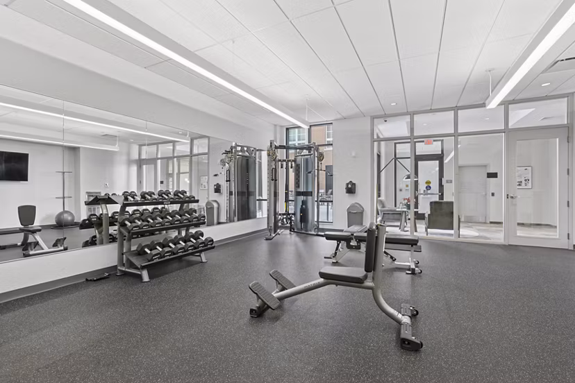 fitness center at The Block at Odell Apartments