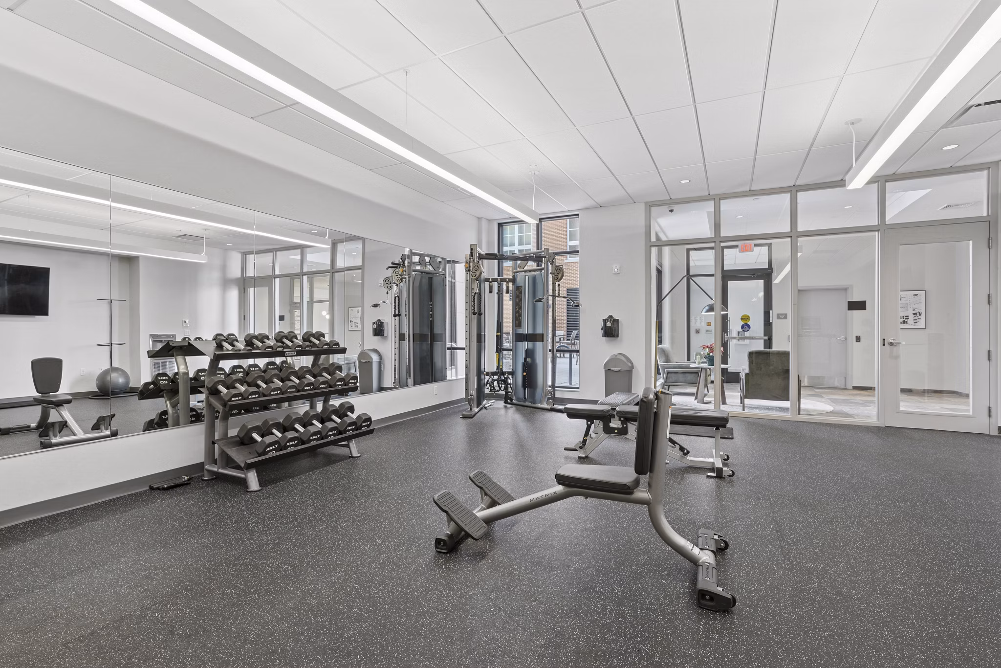 fitness center at The Block at Odell Apartments