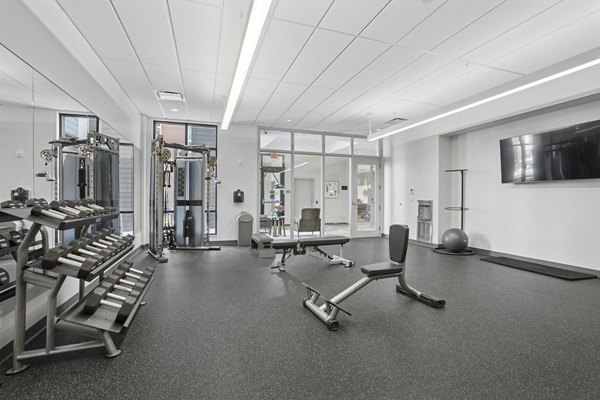 fitness center at The Block at Odell Apartments