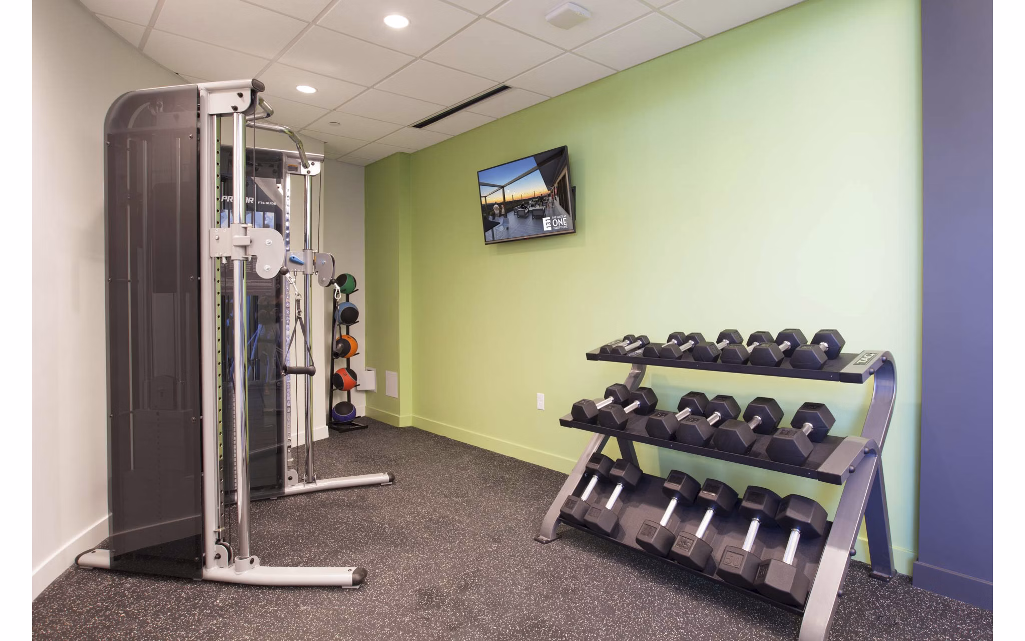fitness center at Flats at 131 Apartments 