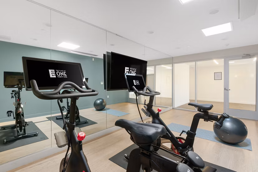 fitness center at Flats at 131 Apartments 