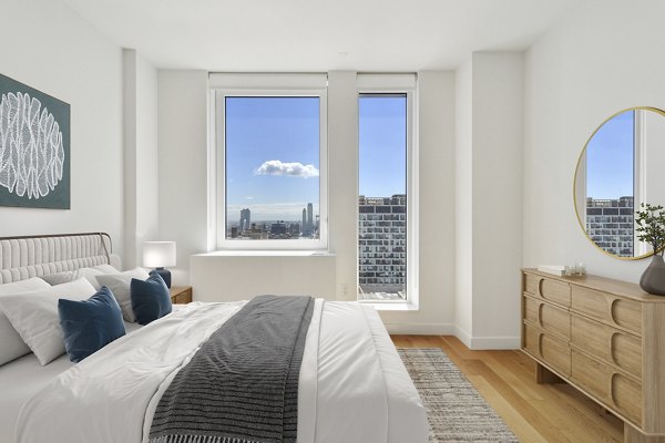 bedroom at The Essex Apartments