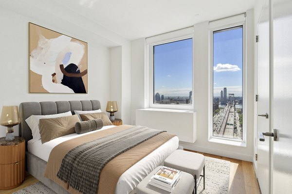 bedroom at The Essex Apartments