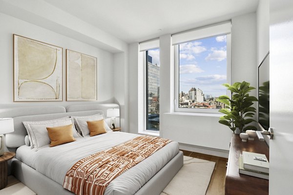 bedroom at The Essex Apartments