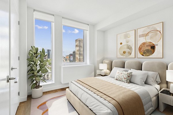 bedroom at The Essex Apartments