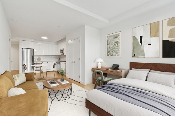 bedroom at The Essex Apartments
