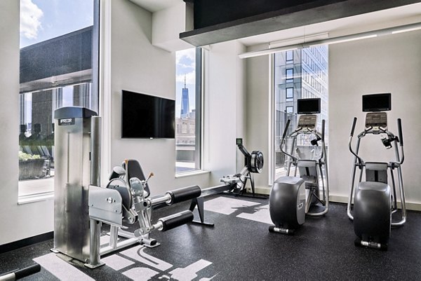 fitness center at The Essex Apartments