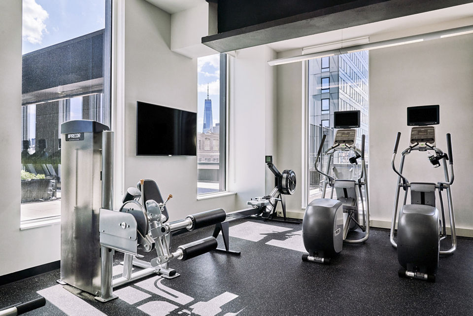 fitness center at The Essex Apartments