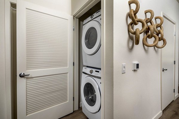 laundry room at Alta Merita Apartments