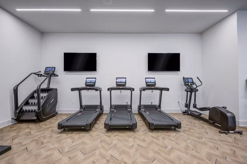 fitness center at The Flynn at Live Oak Apartments