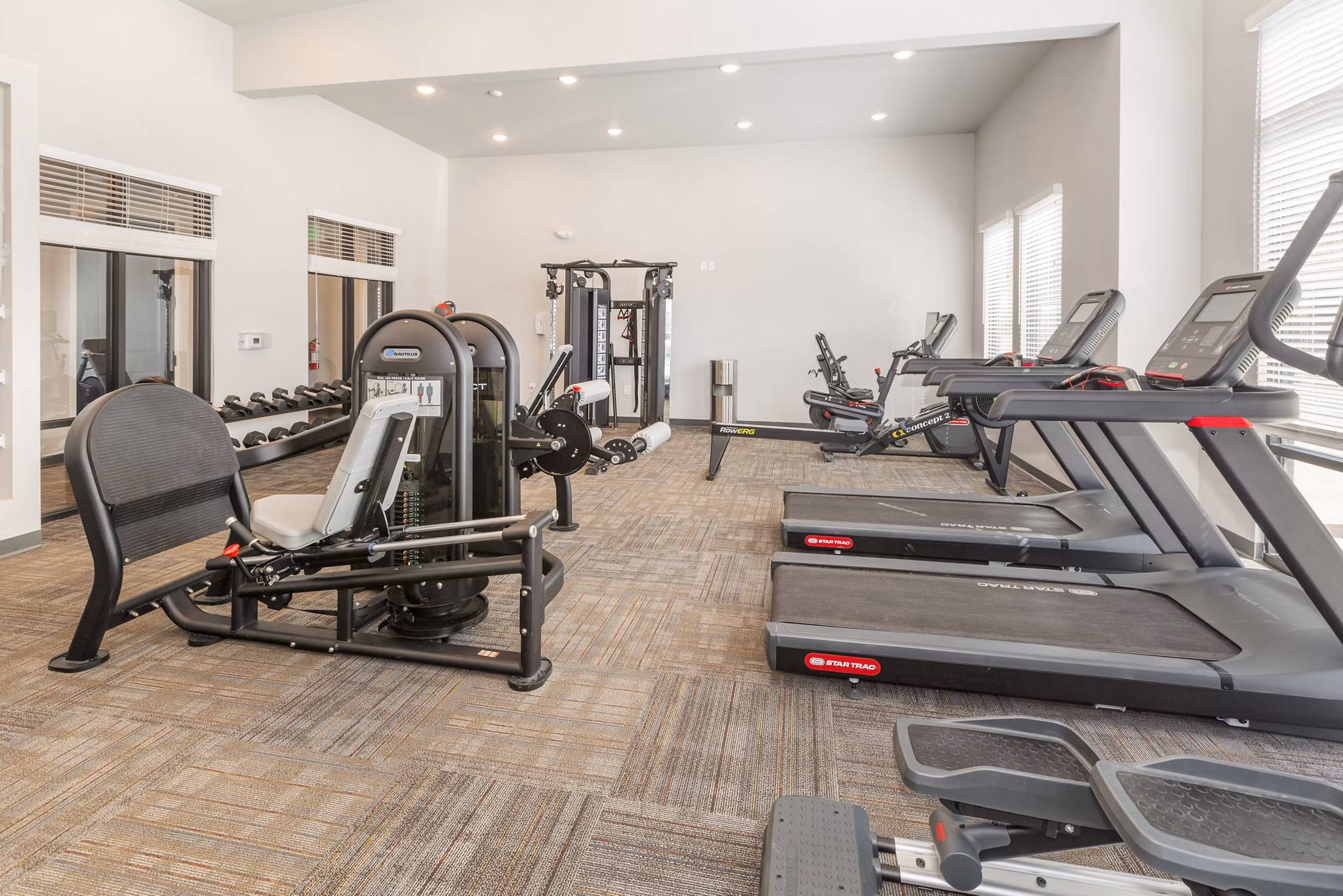 fitness center at Marq at Monument Ridge Apartments