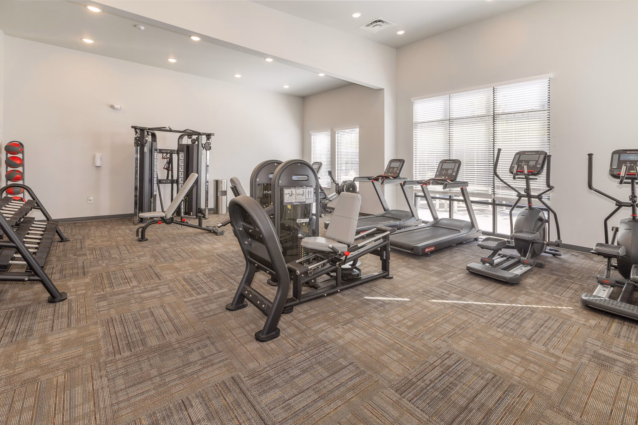 fitness center at Marq at Monument Ridge Apartments