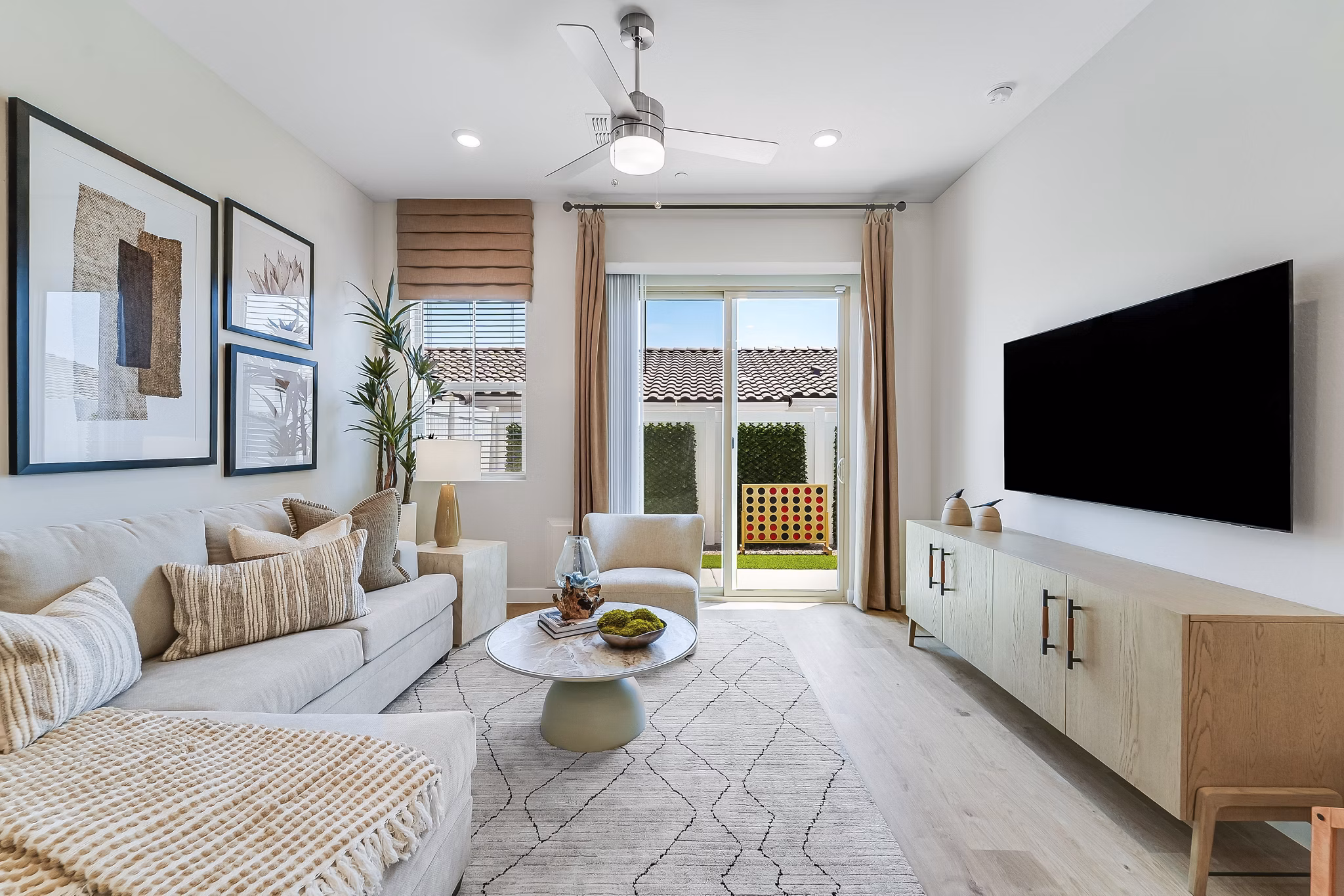 living room at Yardly at Verrado Apartments