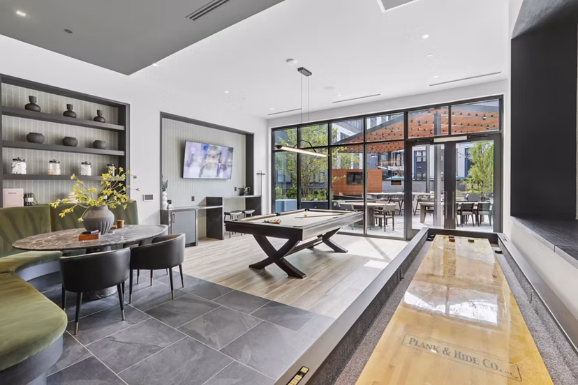 clubhouse game room at Alta New Carrollton Apartments