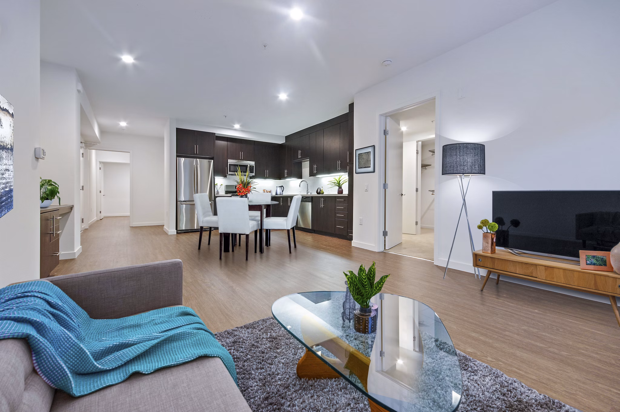 living room at The Metropolitan at Larchmont Village Apartment