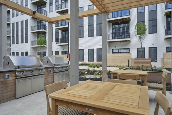 grill area at The Shipwright Apartments]