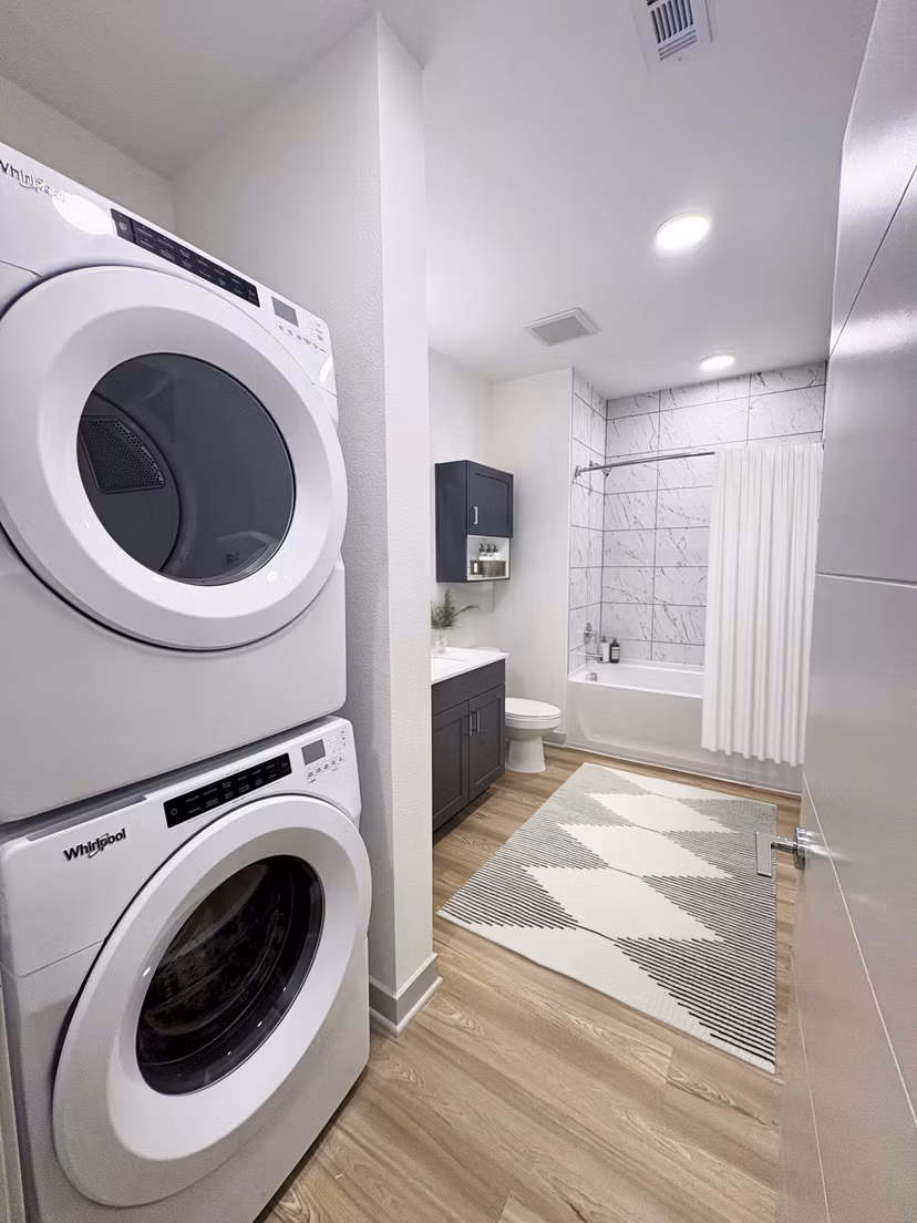 laundry room at Alta Mile High Apartments