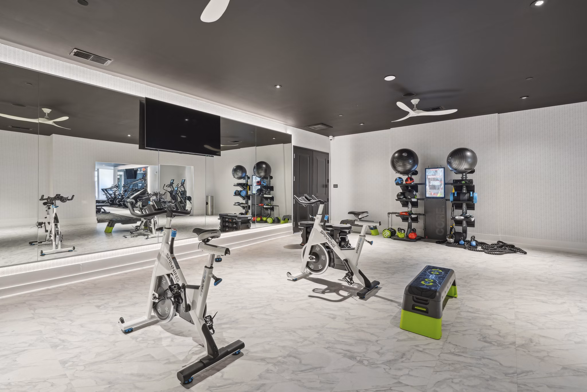 fitness center at The Hartley at Blue Hill Apartments