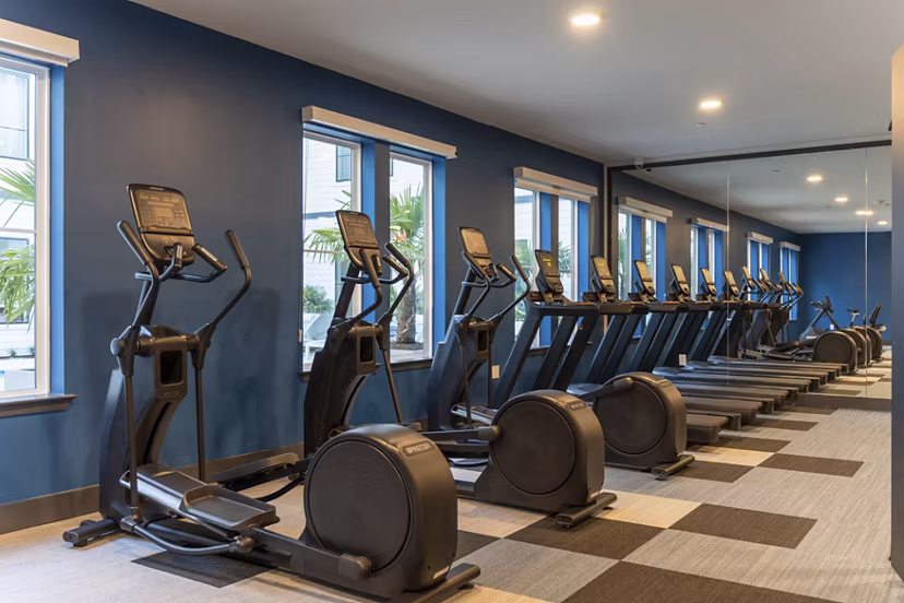 fitness center at COOP Farmers Market Apartments 