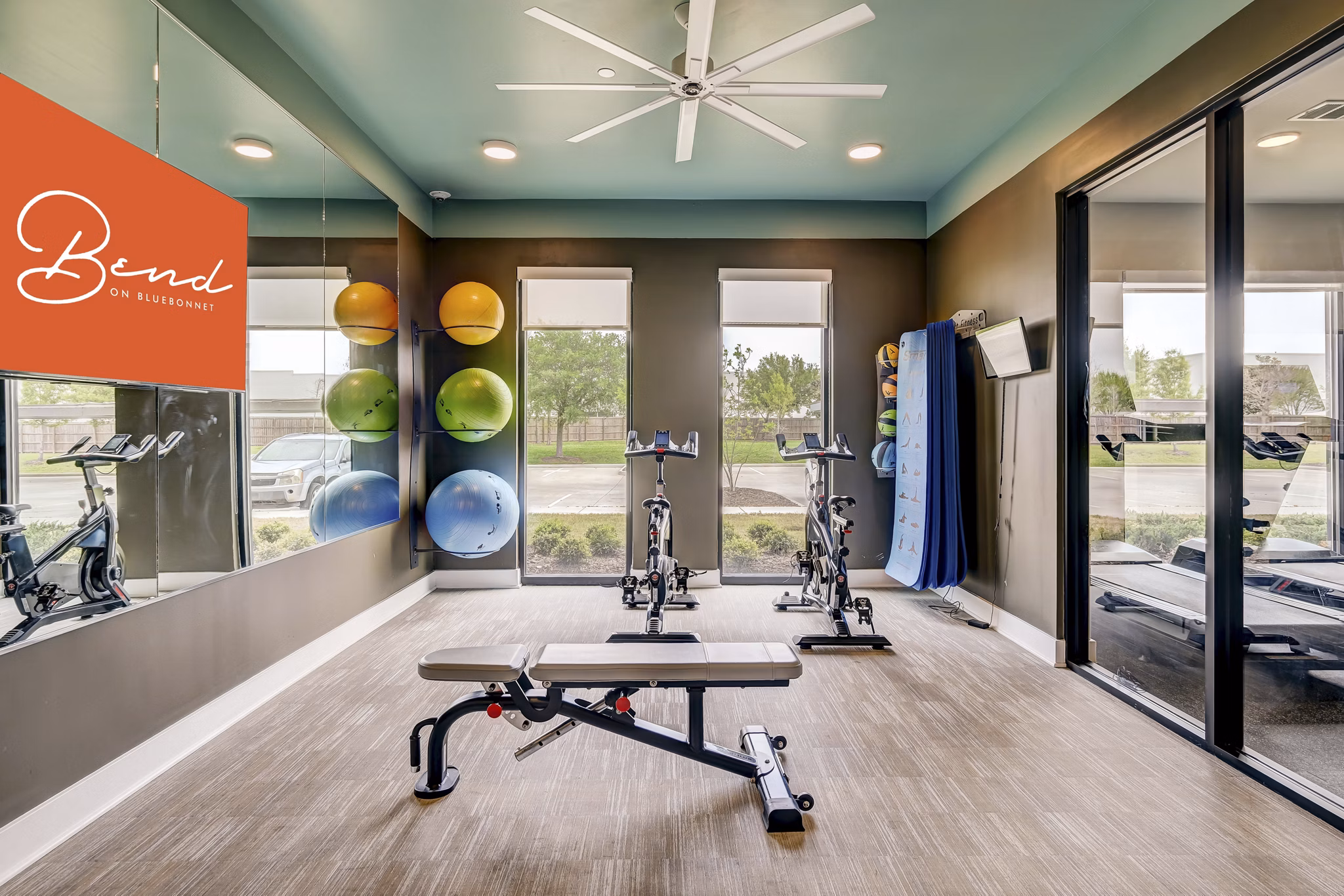 fitness center at Bend on Bluebonnet Apartments