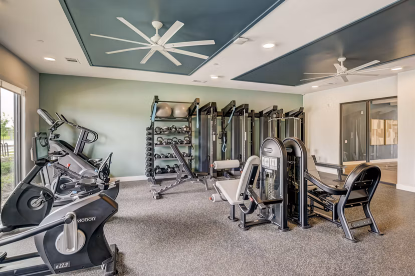 fitness center at Bend on Bluebonnet Apartments