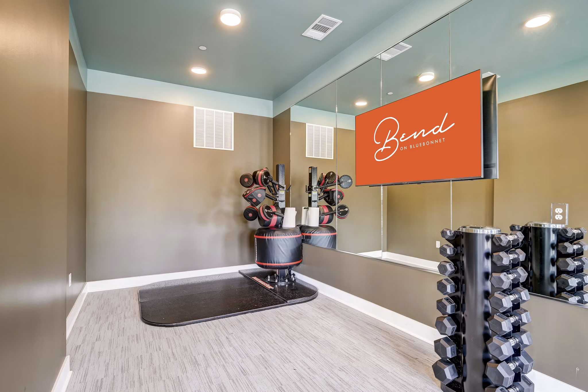 fitness center at Bend on Bluebonnet Apartments