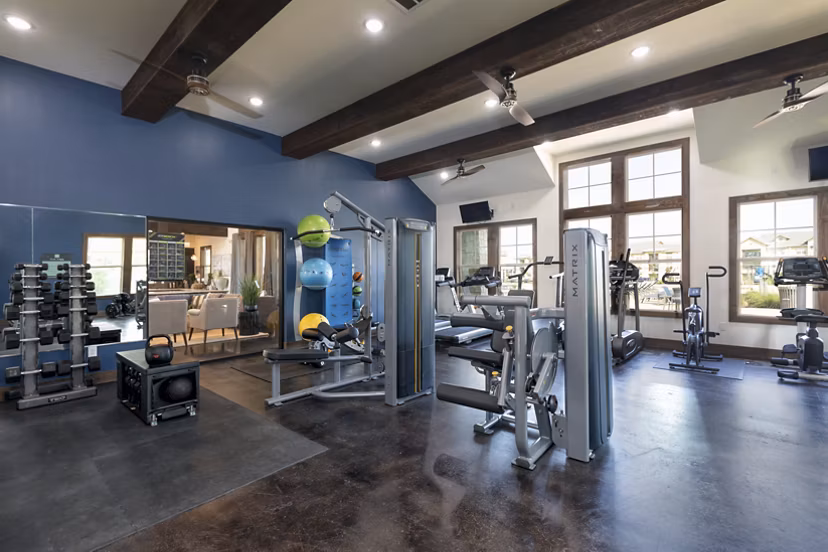 fitness center at 4 Corners Apartments 