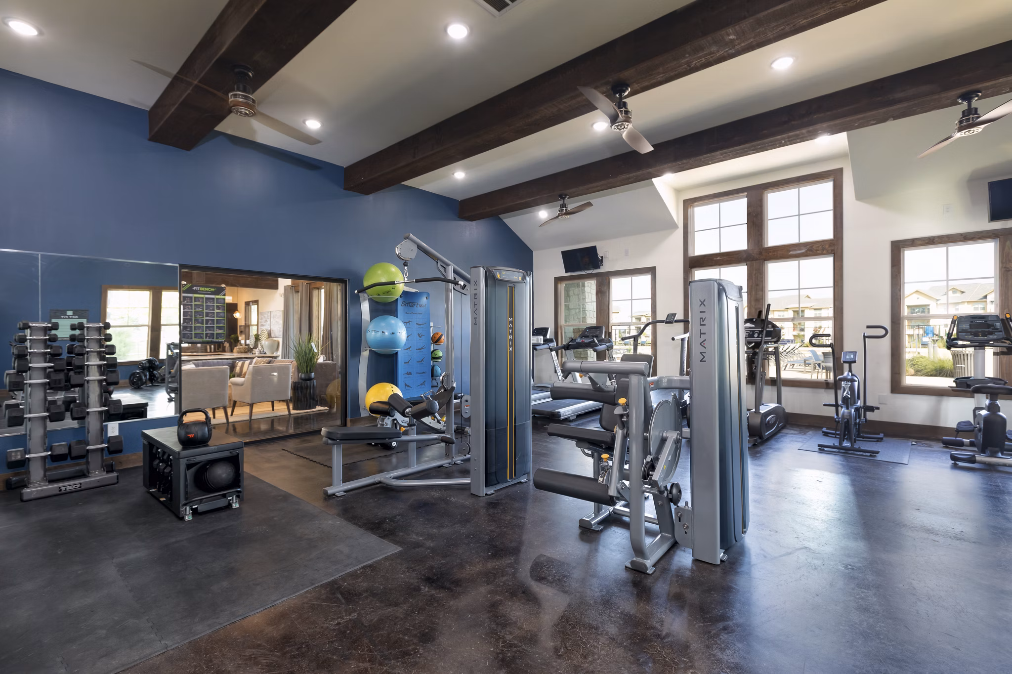 fitness center at 4 Corners Apartments 