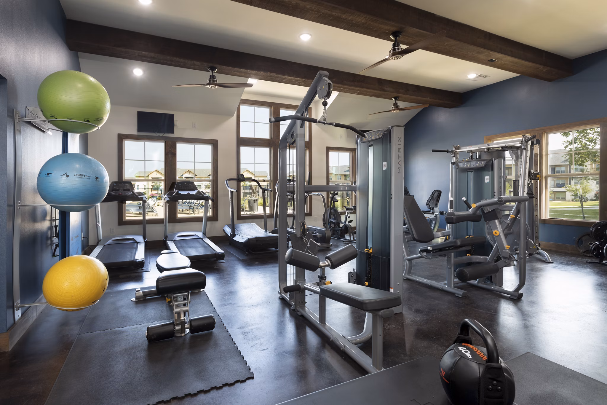fitness center at 4 Corners Apartments 