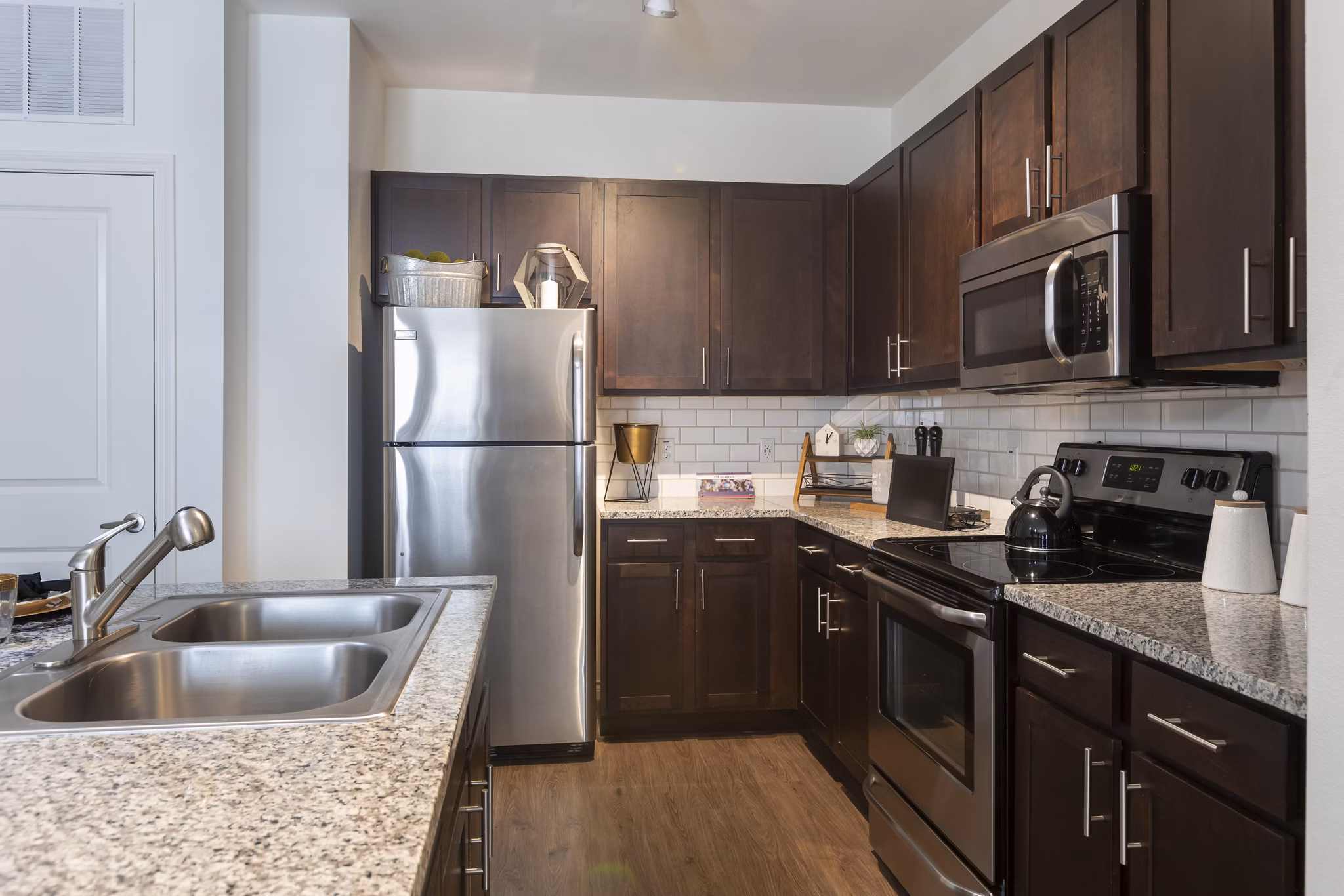 kitchen at 4 Corners Apartments 