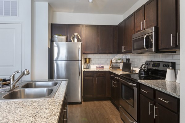 kitchen at 4 Corners Apartments 