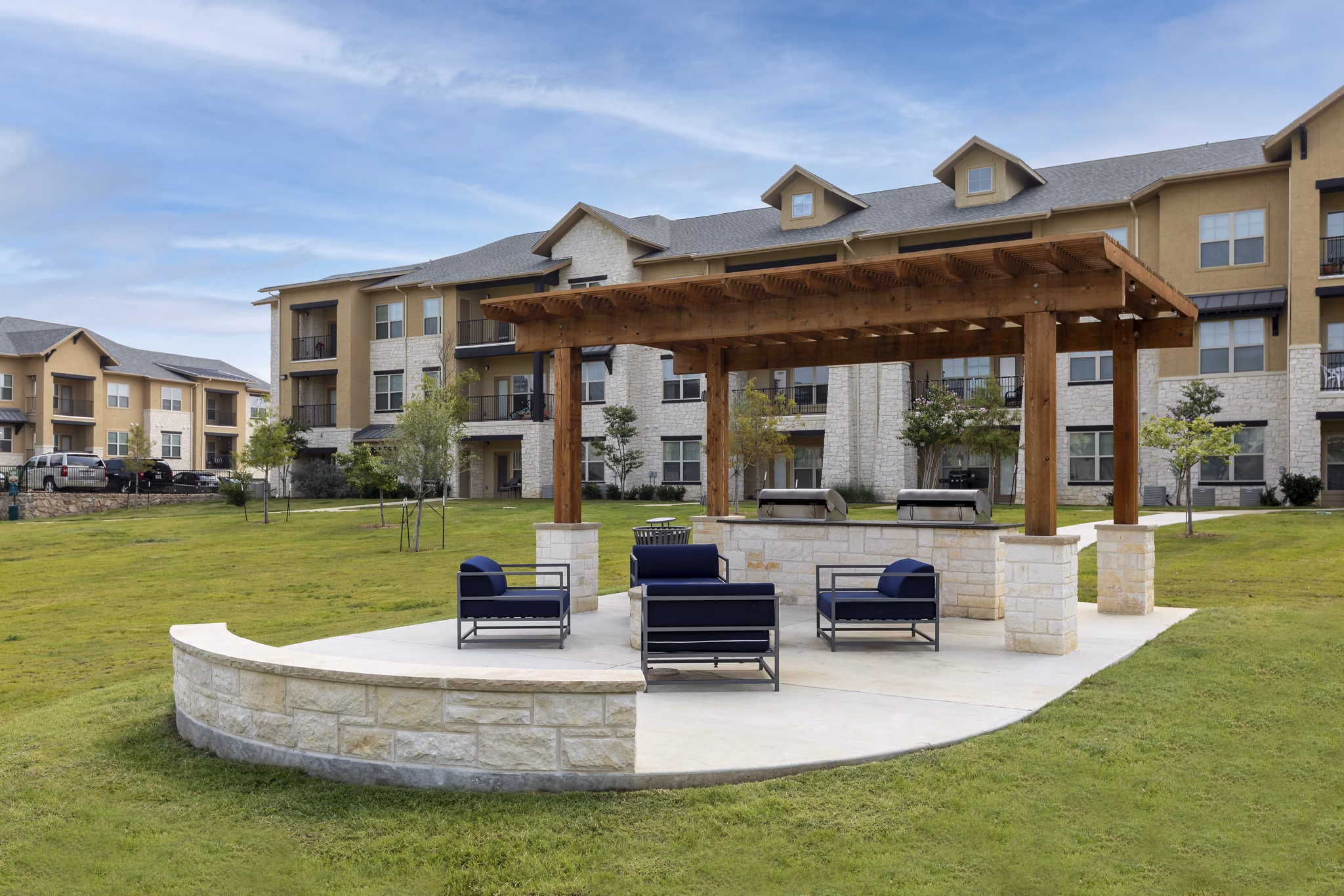 grill area at 4 Corners Apartments 