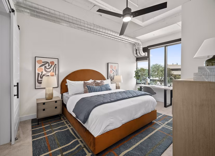 bedroom at The Watt Apartments