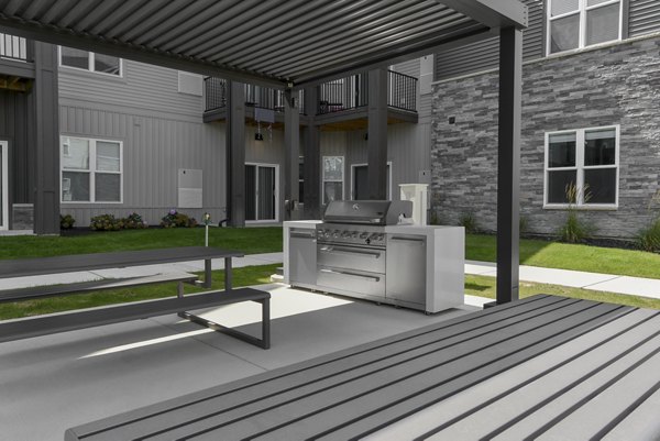 grill area/patio at The Commons at Rivertown Apartments
