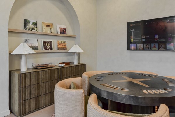 clubhouse game room at The Hallon I Apartments
