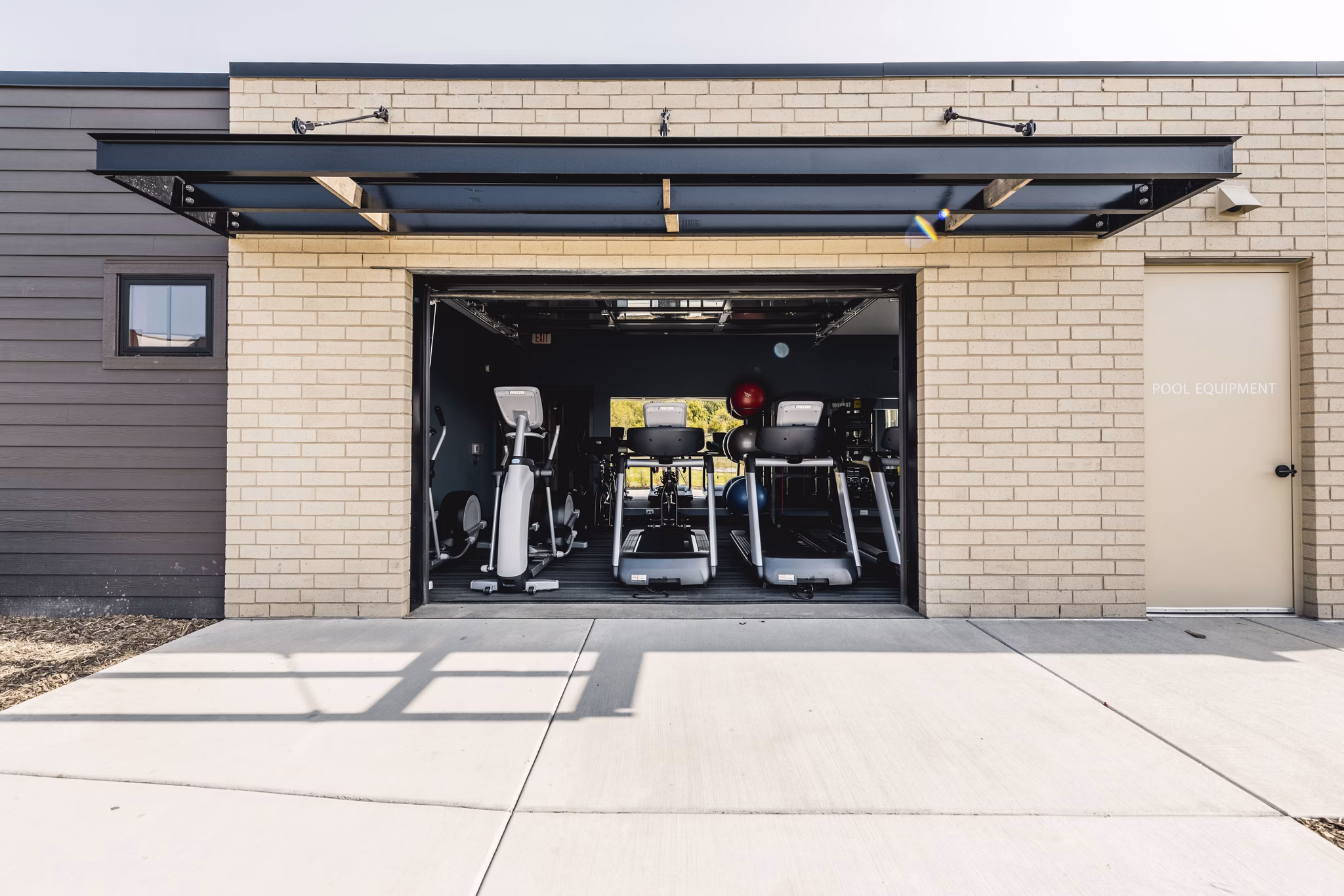 fitness center at Velo Village Apartments