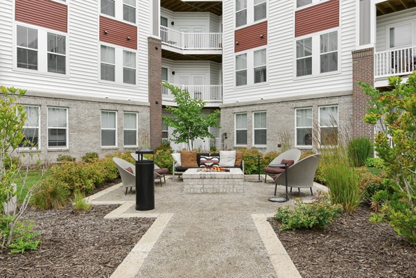 fire pit/patio at The View on Collins Apartments