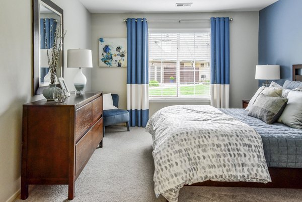 bedroom at The Villas at Main Street Apartments