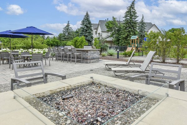 fire pit/grill area/patio at The Villas at Main Street Apartments