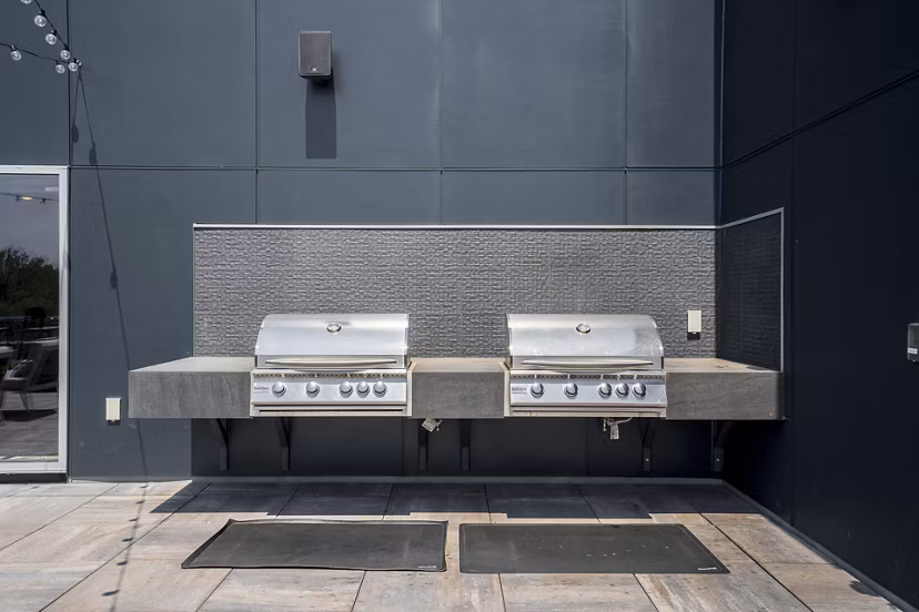 grill area/patio at Harvest Apartments